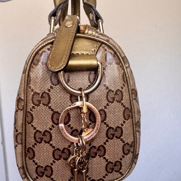 Gucci, Rare metallic gold Gucci mini sachel with bonus Gucci charm - Picture 9 of 14
